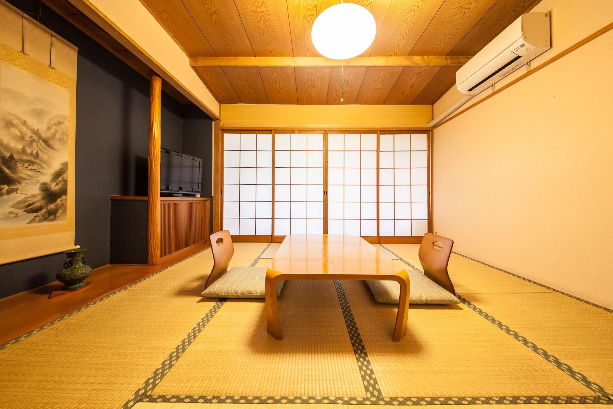 료칸 여명 旅館 黎明 Ryokan Reimei Юфу Экстерьер фото